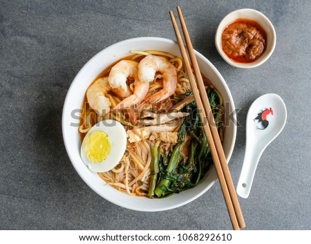 Homemade soup noodle meal / Spicy Prawn Noodle / A delicacy made popular by the Hokkien Chinese in Malaysia and Singapore