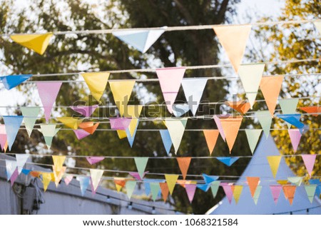 colourful flags decoration in summer camp