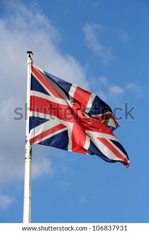 An image of the uk flag in the blue sky