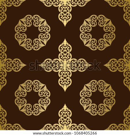 Seamless pattern with golden circle and cross ornaments on brown background