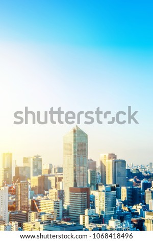 Asia business concept for real estate and corporate construction - panoramic urban city skyline aerial view under twilight sky and golden sun in hamamatsucho, tokyo, Japan