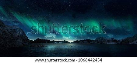 A beautiful green and red aurora dancing over the hills Royalty-Free Stock Photo #1068442454