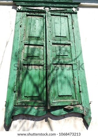 old cut green shutters