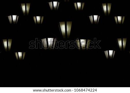 Stylish street lamps isolated with dark background unique photograph