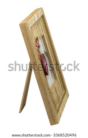 Blank wood photo frame for the desk, side view, isolated on white background. Clipping path included