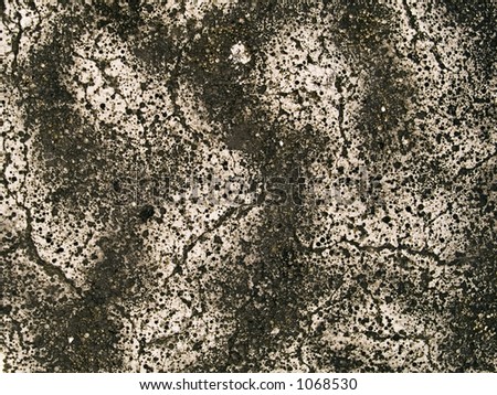 Stock macro photo of the texture of painted asphalt.  Useful for layer masks or abstract backgrounds.