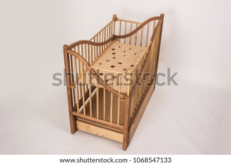 folding wooden child bed isolated