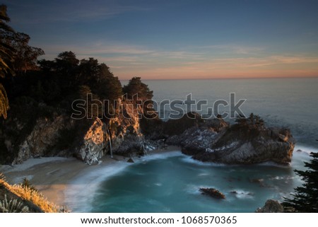 Unique view at Mc Way waterfall in Julia Pfeiffer Burns State Park at sunrise