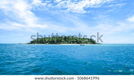Island in the sea with the blue sky