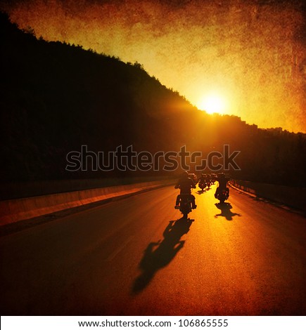 Motorcycle ride, people driving motorbikes, large group of bikers on the summer ride parade, moving on sunset street, summer travel, road trip, freedom lifestyle Royalty-Free Stock Photo #106865555