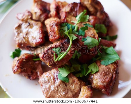 Traditional Typical Freshly Made Greek Souvlaki Seved with Parsley