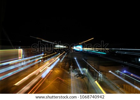 shutter speed, zoom and turn. cityscape.