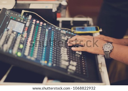 sound check for concert, Mixer control, Music engineer, Backstage 
