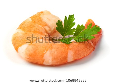 Delicious tiger shrimps with herbs, isolated on white background. Seafood.