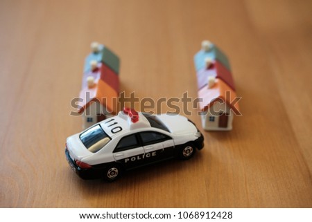 Miniature house and Police car