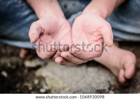 Wrinkled hands begging asking for money. Closeup hands poor child begging you for help concept for poverty or hunger people, human rights. Beggar people and human poverty concept