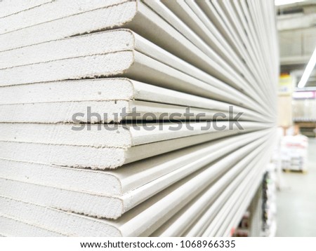 The stack of gypsum board preparing for construction Royalty-Free Stock Photo #1068966335
