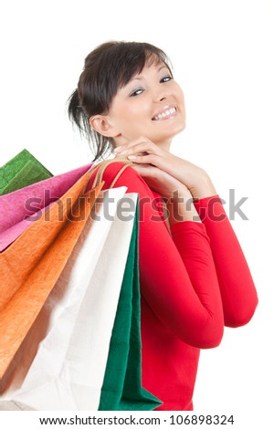 happy girl with shopping bags, white background