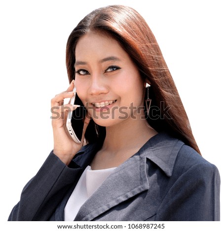 Beautiful young asian business woman usesing cell phon.