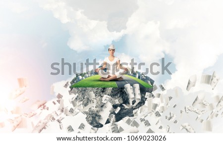 Woman in white clothing keeping eyes closed and looking concentrated while meditating on island in the air among flying papers with cloudy skyscape on background. 3D rendering.