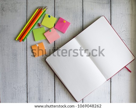 Background with neon color chancery and notebook