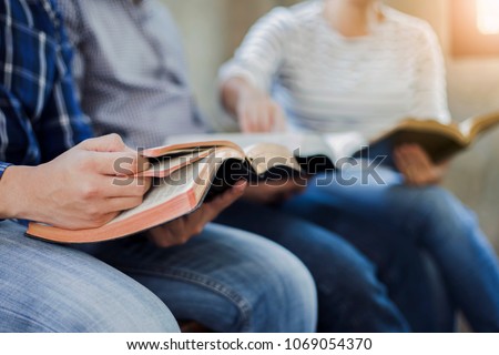close up of christian group are reading and study bible together in Sunday school class room Royalty-Free Stock Photo #1069054370