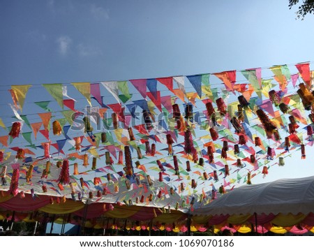 
Colorful flags at festivals on the sky background