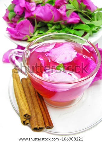rose punch tea cocktail punch in cup with cinnamon