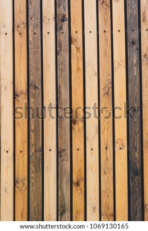 wooden fence for a country house. fragment of wood products