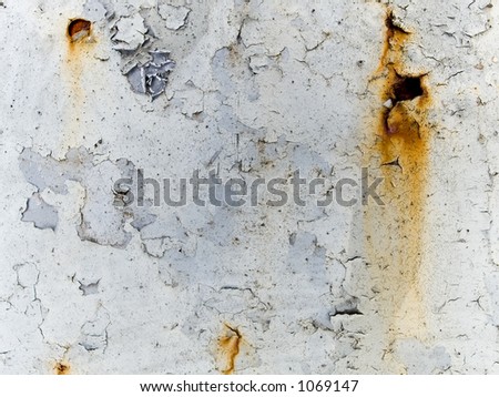 rusty flaky white wall
