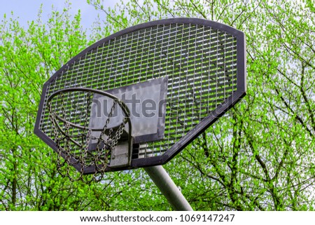 Basketball hoop silhouette. Basketball hoop with sunset silhouette background