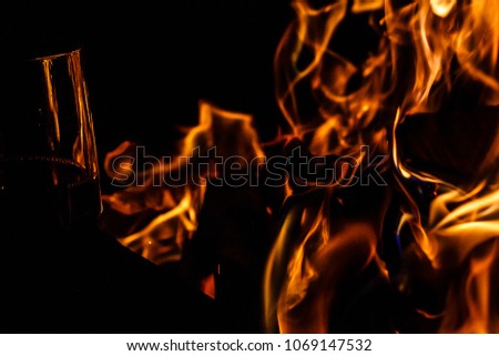 Flames from a fire on a black background picture