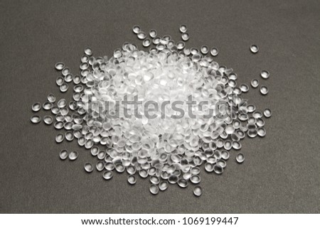 HDPE. Transparent Polyethylene granules.Plastic pellets. Plastic Raw material .High Density Polyethylene (PE-HD), PE-LD.  IDPE. Royalty-Free Stock Photo #1069199447