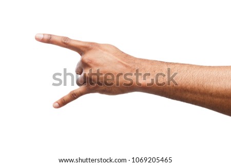 Male black hand making rock'n'roll gesture, close up, isolated on white backgroung