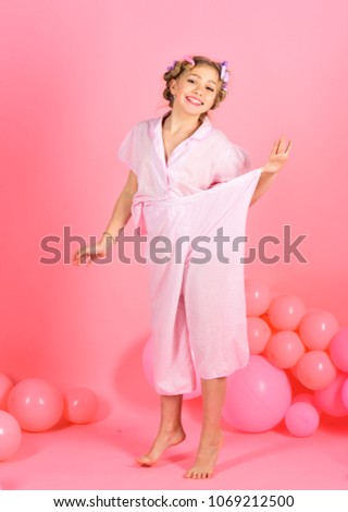 Happy child in under wear in air balloons. Pajama party balloons on pink studio background. Retro kid girl, pin up, fitness. Birthday decor, childhood. Little girl, dieting, punchy pastels, sport.