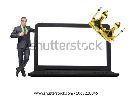 Little businessman standing near big laptop computer with blank screen and showing on it by his index finger isolated. Royal special offer template. Premium product presentation.