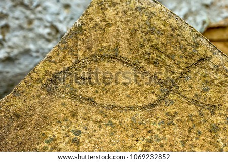 Ichthus christian symbol in stone