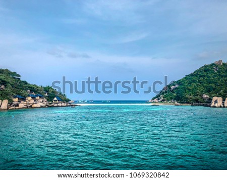 Picture of sea side between islands background. Image picture