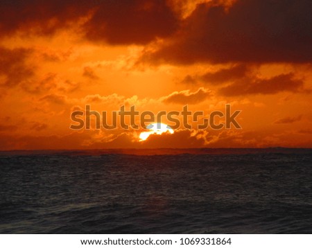sunset on a beach in kauai