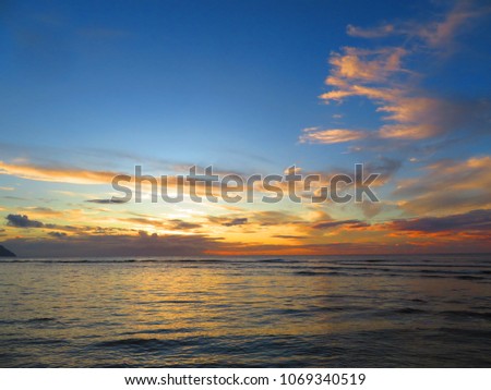 scenic sunset on a beach in kauai