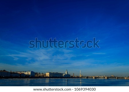 Blue sky city river