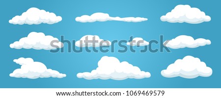 Clouds set isolated on a blue background. Simple cute cartoon design. Icon or logo collection. Realistic elements. Flat style vector illustration. Royalty-Free Stock Photo #1069469579