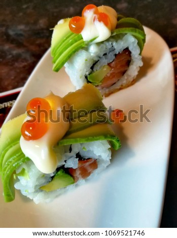 Delicious sushi on a white plate