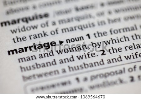 Close up to the dictionary definition of Marriage