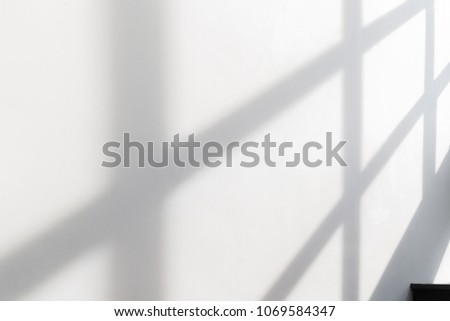 White empty wall with window shadow , perspective Royalty-Free Stock Photo #1069584347
