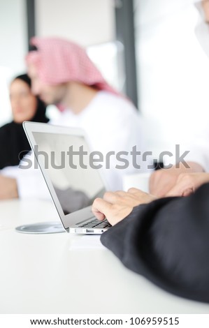 Successful and happy businessar arabic people sitting for a meeting