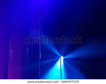 A Blurred picture of Colourful spotlight background performance stage show