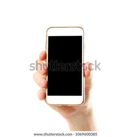 Hand holding white phone with blank black screen. Close up. Isolated on white background.