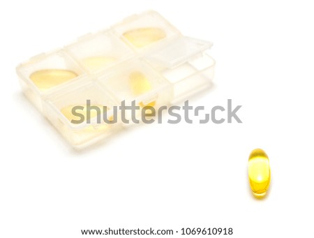 Pill and pill bottle on white background :medical concept