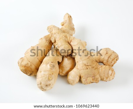 fresh ginger roots on white background